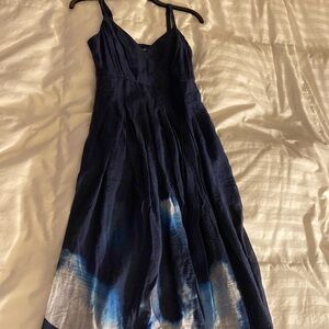 Navy dress with beautiful pattern/colorslower part of dress. Brand new with tags